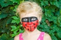 Ladybug face painting Royalty Free Stock Photo