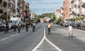 Laeken, Brussels Capital Region - Belgium - Young migrant children driving the bicycle at the Bockstael Avenue during the Car Free