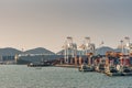 Vehicles ship with container terminal up front at Laem Chabang Thailand Royalty Free Stock Photo