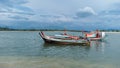 Laem Son National Park, Ranong, Thailand - November 2021 : Pier in National park with local fishing boats Royalty Free Stock Photo