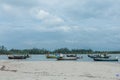 Laem Son National Park, Ranong, Thailand - November 2021 : Pier in National park with local fishing boats Royalty Free Stock Photo