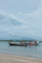 Laem Son National Park, Ranong, Thailand - November 2021 : Pier in National park with local fishing boats Royalty Free Stock Photo