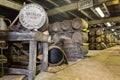 Lafroaig old wooden barrels and casks in cellar at whisky distillery in Scotland Royalty Free Stock Photo