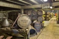 Lafroaig old wooden barrels and casks in cellar at whisky distillery in Scotland