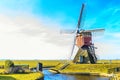 Lagenwaardse historic smock mill in Dutch polder landscape