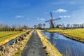 Lagenwaardse historic smock mill in Dutch polder landscape