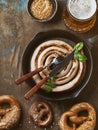 Lager beer with sausage and pretzels Royalty Free Stock Photo