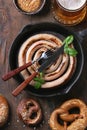 Lager beer with sausage and pretzels Royalty Free Stock Photo