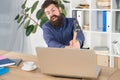 Lagging system. Hate office routine. Man bearded crush computer. Software license agreement. Destroy laptop. Hateful job Royalty Free Stock Photo