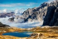 Laghi del piani lakes view and huge rocky mountains in Tre Cime di Lavaredo park