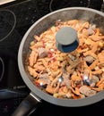 Lagman laghman food - Central Asian dish of pulled noodles, meat, vegetables. Ramen frying pan on the stove macro photo Royalty Free Stock Photo