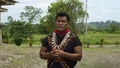 Cofan ethnic man talking in traditional clothing in the Cofan Dureno millennium community located on the edge of the Aguarico Royalty Free Stock Photo