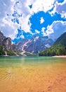 Lago di Braies lake turquoise water and Dolomites Alps view