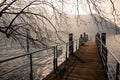 Lago di Como, Italy. Pespective view of a ferry pier at sunset. Winter landscape.
