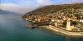 Lago di Grada lake scebery. Aerial view of Torri del Benaco village and castle