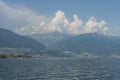 Lago maggiore lake scenery with mountain water and cloudy sky Royalty Free Stock Photo