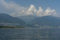 Lago maggiore lake scenery with mountain water and cloudy sky Royalty Free Stock Photo