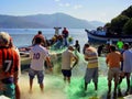 Lagoa da ConceiÃÂ§ÃÂ£o, Florianopolis Sant catarina Brazil/11th June 2011/ Local fishermen and bystanders help with sorting a catch