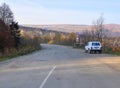 LAGONAKI, RUSSIA - OCTOBER 15, 2014: Asphalt road goes into unpaved. The road to the plateau Lago-Naki. Caucaved. Caucasus