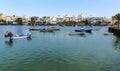 The lagoon of Charco de San Gines in Arrecife, Lanzarote and a flotilla of small boats Royalty Free Stock Photo