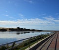 Lagoon, promenade and blue sky, Maspalomas Royalty Free Stock Photo