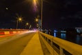 Traffic light streaks on Ikoyi Lekki link bridge Lagos Nigeria at night.