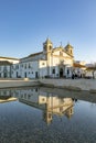 Square of Lagos city with cathedral in water reflection in Algarve Royalty Free Stock Photo