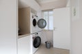 Domestic utility room with LG washing machine and dryer