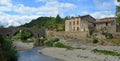 Lagrasse, Aude, Languedoc France. Medieval Bridge river and historic buildings Royalty Free Stock Photo