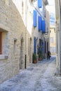 A man walks by one of the streets of Lagrasse France