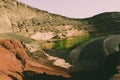 Laguna de Los Clicos on the coast of Lanzarote with its green lagoon inside the crater of the volcano