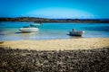 Laguna with white boats at Isla de los Lobos Royalty Free Stock Photo