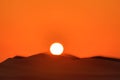 Sunset over Lahbab desert red ridges Dubai  UAE Royalty Free Stock Photo