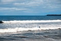 Lahinch town coast line. County Clare, Ireland, Sunny day, blue cloudy sky. Nobody. Powerful waves moving towards the beach. Royalty Free Stock Photo