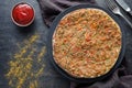 Lahmacun traditional turkish delicious pizza with minced beef or lamb meat, paprika, tomatoes, cumin spice