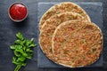 Lahmacun traditional turkish pizza with minced beef or lamb meat, paprika, tomatoes, cumin spice Royalty Free Stock Photo