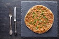 Lahmacun traditional turkish pizza with minced meat, paprika tomatoes, parsley baked spicy food Royalty Free Stock Photo