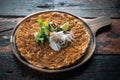 Lahmacun traditional Turkish pizza with salad on rustic wooden table