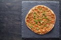 Lahmacun turkish gourmet pizza with minced beef or lamb meat, paprika, tomatoes Royalty Free Stock Photo