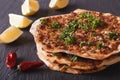 Lahmacun - Turkish pizza closeup on a table. horizontal Royalty Free Stock Photo