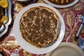 Lahmajun round,a thin piece of dough topped with minced meat