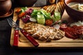 Laid dinner on the table, onion and egg soup, rice, chicken breast. Royalty Free Stock Photo