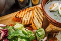 Laid dinner on the table, onion and egg soup, rice, chicken breast. Royalty Free Stock Photo