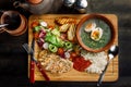 Laid dinner on the table, onion and egg soup, rice, chicken breast. Royalty Free Stock Photo