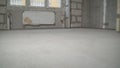 Laid for the floor. Freshly laid concrete floor in the apartment. Smooth surface of screed or fresh cement laid for the floor Royalty Free Stock Photo