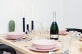 Laid table with bottle of sekt