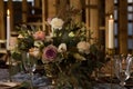 Laid Table By wedding banquet in a barn. Close-up. Royalty Free Stock Photo