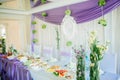 A laid wedding banquet table at a restaurant