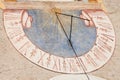 LAION, ITALY - SEPTEMBER 02, 2020: The recently restored sundial painted outside the bell tower of the church of the town