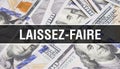 Laissez-faire text Concept Closeup. American Dollars Cash Money,3D rendering. Laissez-faire at Dollar Banknote. Financial USA Royalty Free Stock Photo